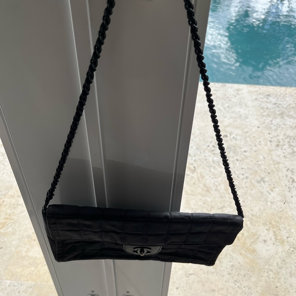 Older model authentic Chanel bag with dust bag
